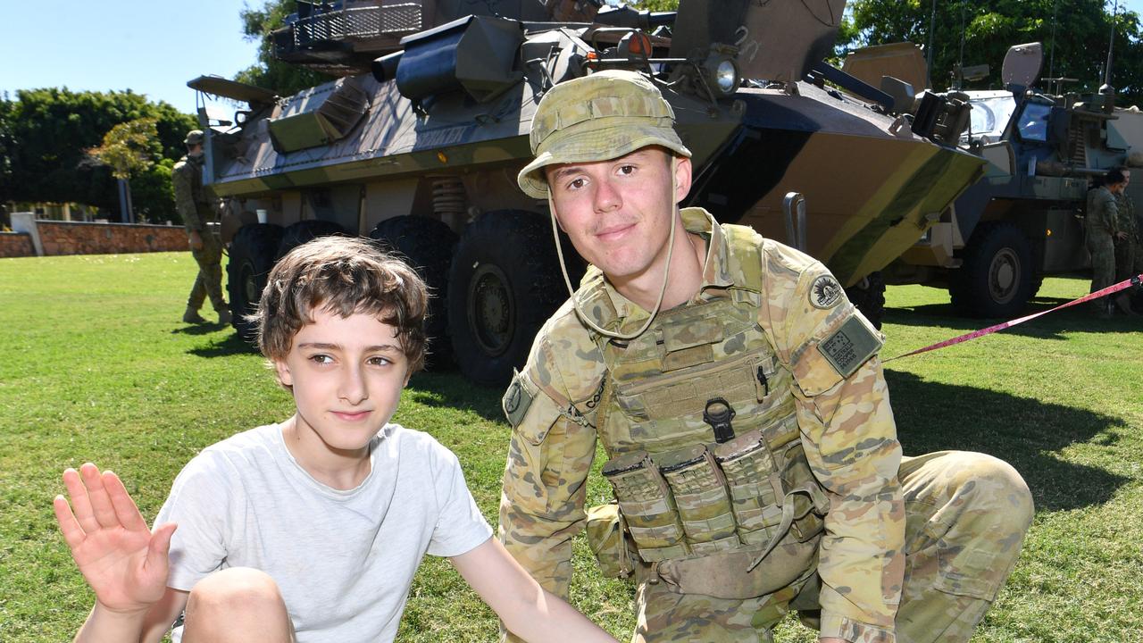 Legacy Centenary Torch Relay and community day at Jezzine Barracks. Levi Wosner, 11, with Private Sam Cooper from 3RAR. Picture: Evan Morgan