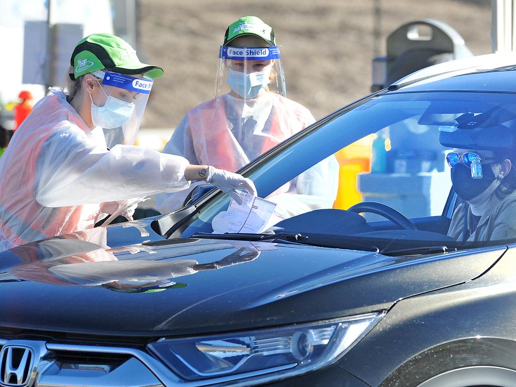 COVID-19 tests are carried out at the Springfield Central shopping centre. Picture: NewsWire / John Gass