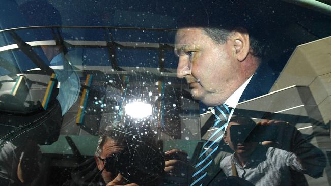 Former Ipswich mayor Paul Pisasale is driven away from Brisbane Magistrates Court on Monday. Picture: Darren England/AAP