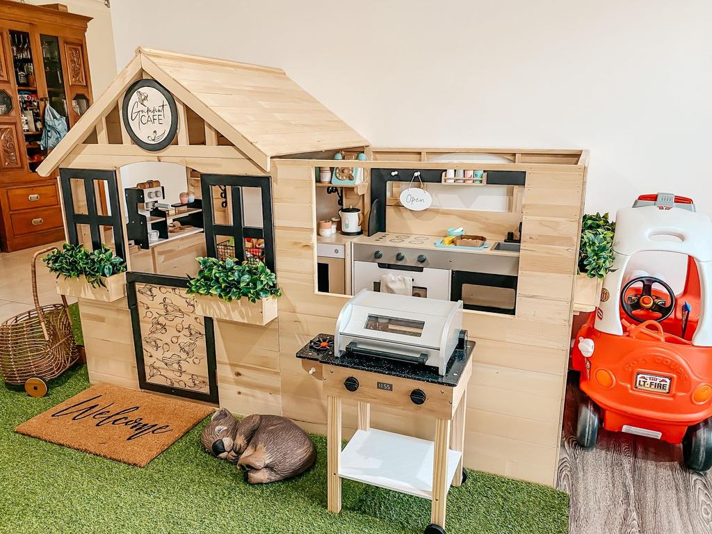 Shannon Rickard, 32, from Redland Bay in south Brisbane, transformed two Kmart cubby houses to create this ‘cubby cafe’ for her three boys. Picture: Supplied