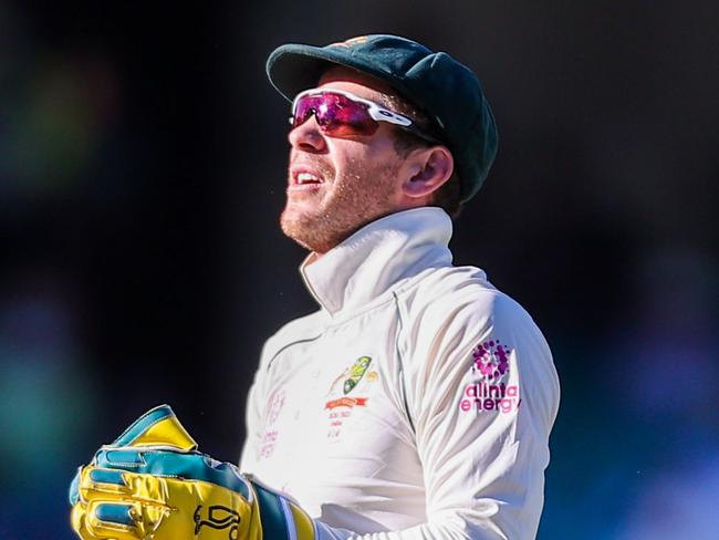 Australia's captain Tim Paine (L) and Marnus Labuschagne react during the fifth day of the third cricket Test match between Australia and India at the Sydney Cricket Ground (SCG) in Sydney on January 11, 2021. (Photo by DAVID GRAY / AFP) / -- IMAGE RESTRICTED TO EDITORIAL USE - STRICTLY NO COMMERCIAL USE --