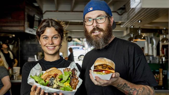 The LC Miami. Josie Zavadil holding the Breakfast box from Flora by Greenhouse Canteen and Jim Washington holding the Big BVK from BVK (Burgers Vs Kebabs). Picture: Jerad Williams