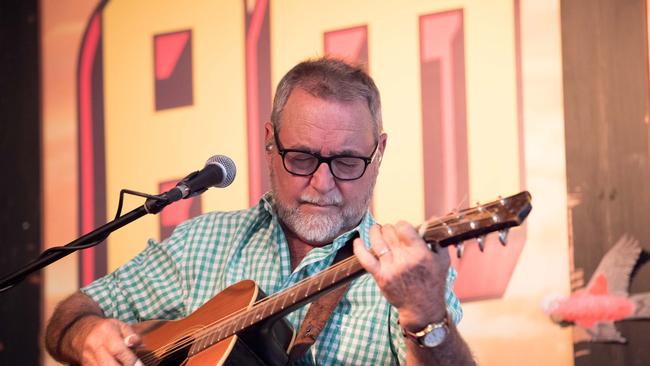 Country music songwriter John Williamson at his private mountain retreat at Springbrook. One weekend every year 200 guests get to meet and talk with John around the camp fire and also enjoy an intimate performance. Picture by Luke Marsden.