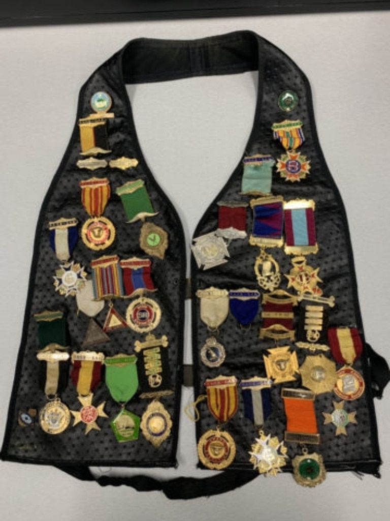 A vest adorned with Royal Antediluvian Order of Buffaloes badges was handed into police along with other ceremonial items. Picture: Supplied.