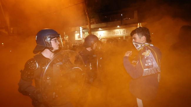 Young soccer fan comes face-to-face with public order response team.