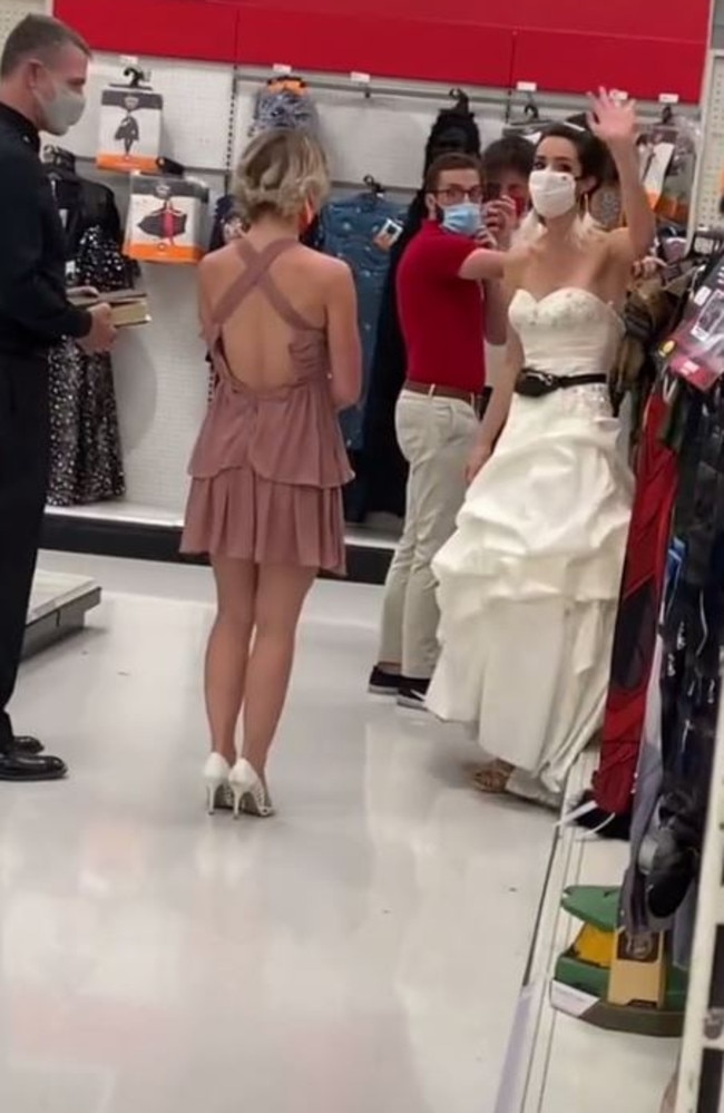 The bride, who is seen waving at those filming her, said she has been waiting for two years since he proposed, to marry him. Picture: TikTok/@boymom_ashley