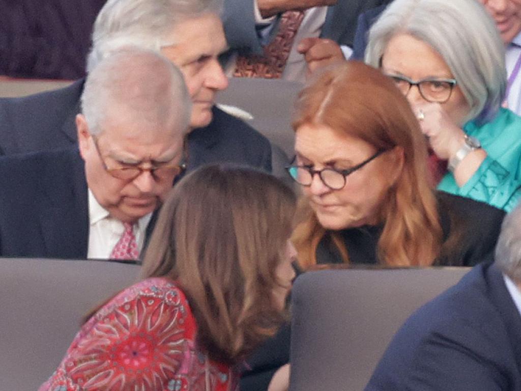 Prince Andrew and ex-wife Sarah Ferguson were in good spirits chatting and reading through the concert program. Picture: Getty Images