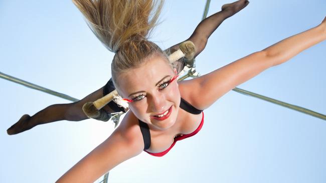 Studying circus arts means never being scolded for hanging upside in class.