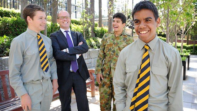 Johnny Samengo is pictured with students