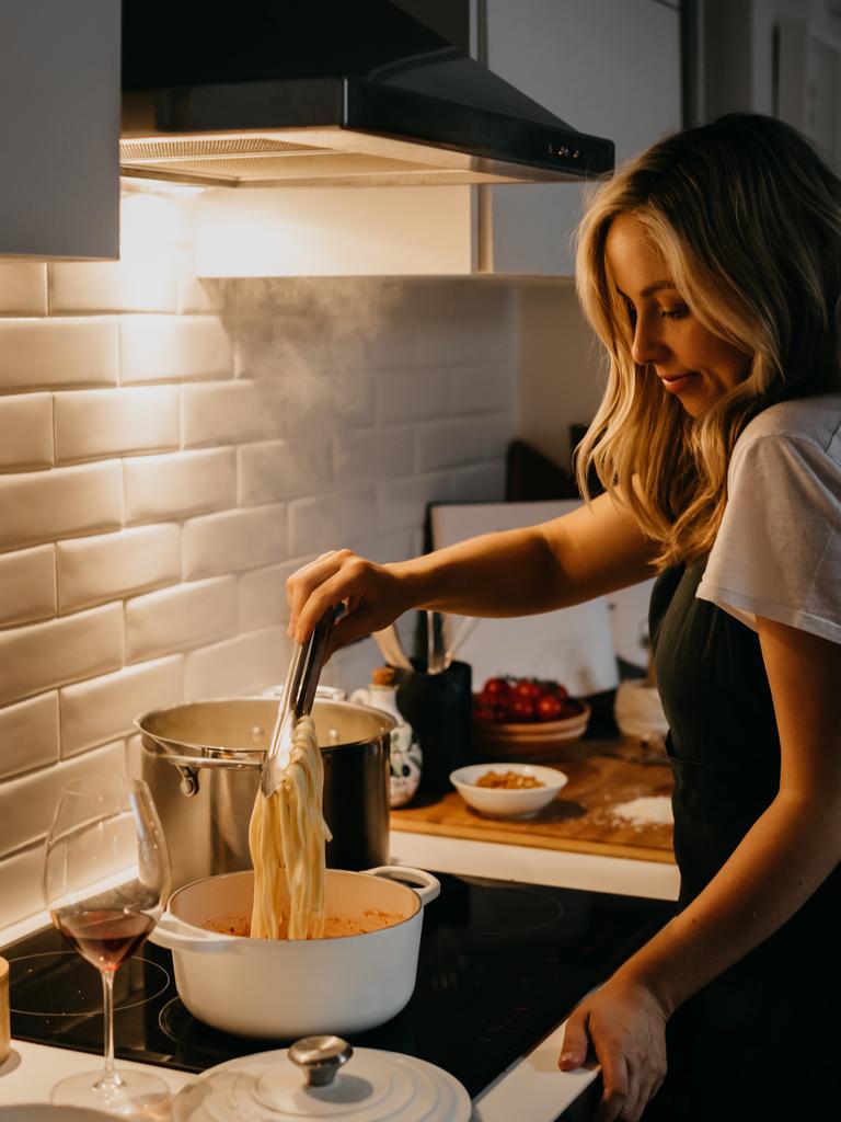 Hewson preparing a dish from her second cookbook, Saturday Night Pasta. Picture: Nikki To