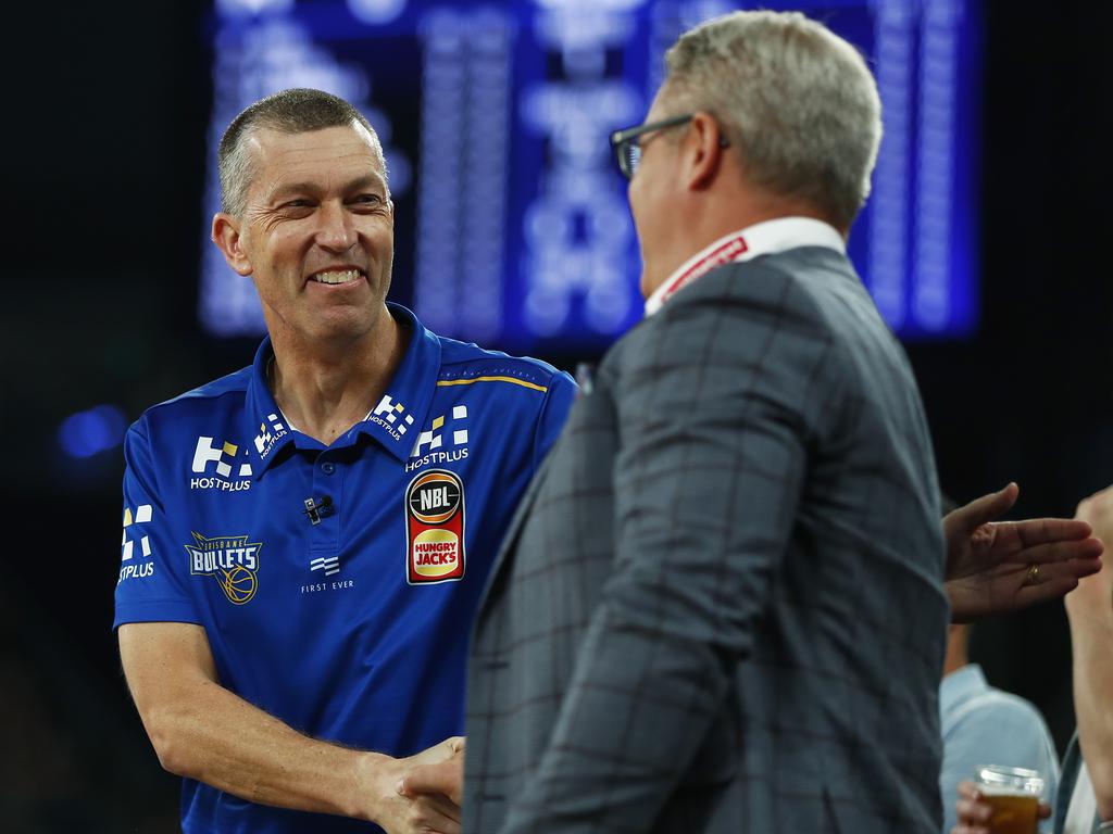 Vickerman shakes hands with Lemanis, who he assisted during his time in New Zealand. Picture: Getty Images