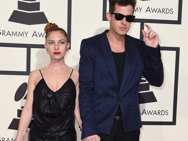 Fifty shades of cool: Mark Ronson with Josephine de La Baume. Picture: AFP