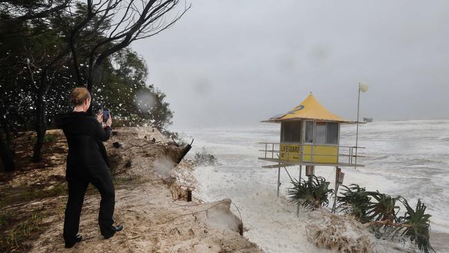 Gold Coast battered by Cyclone Alfred, as it made land. Tower 42 on The Spit becomes a tourist attraction.. Picture Glenn Hampson