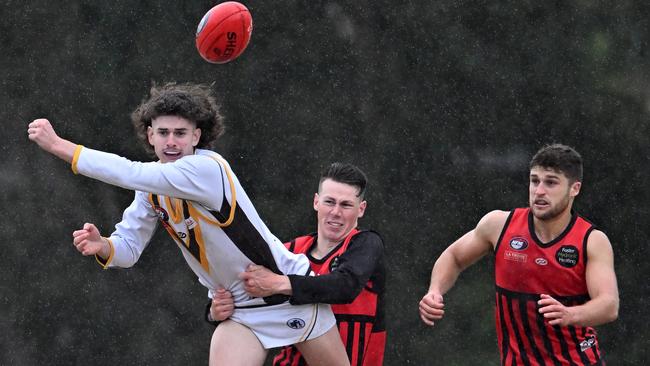 NFL: Panton Hill and Thomastown players battle for the ball. Picture: Andy Brownbill