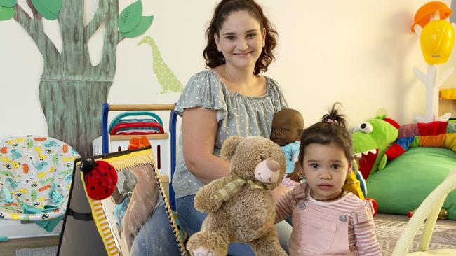 Peer support worker Molli Robinson and her daughter Armani Savea at the Young Mothers for Young Women centre in Caboolture. (AAP/Image Sarah Marshall)