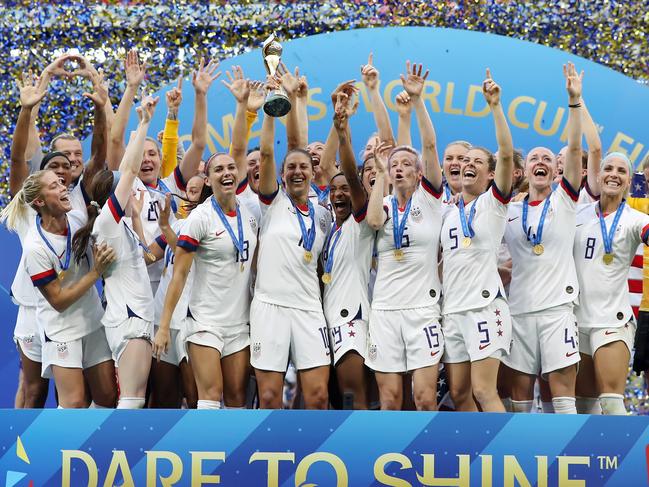LYON, FRANCE - JULY 07:  Carli Lloyd of the USA lifts the FIFA Women's World Cup Trophy following her team's victory in the 2019 FIFA Women's World Cup France Final match between The United States of America and The Netherlands at Stade de Lyon on July 07, 2019 in Lyon, France. (Photo by Elsa/Getty Images)