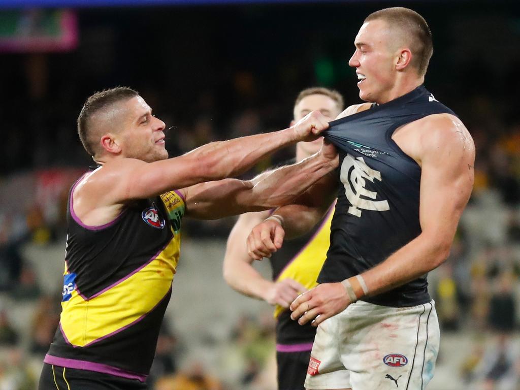 Dion Prestia and Patrick Cripps come to grips. Picture: AFL Photos/Getty Images