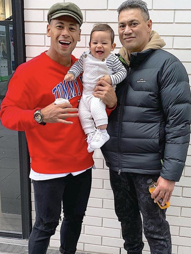 Special bond: Isaako with his father.