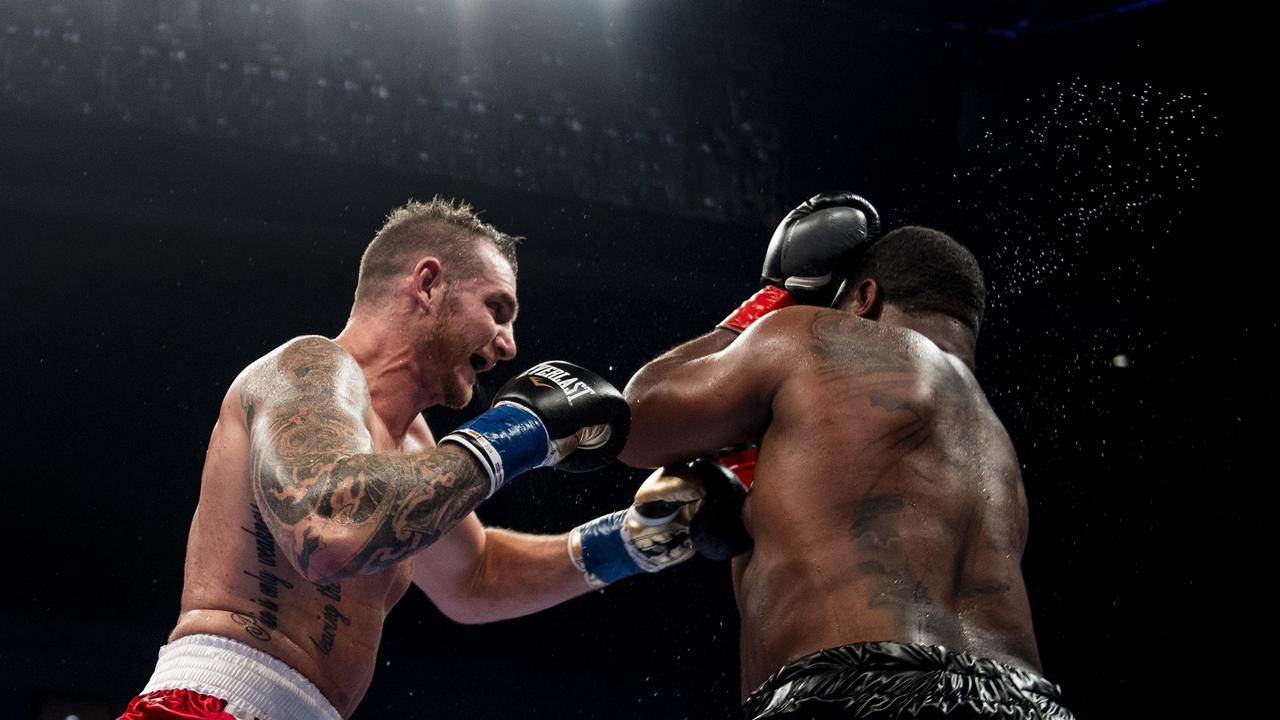 MANCHESTER, NH - NOVEMBER 19: Demsey McKean lands a punch during the junior welterweight bout against Don Haynesworth at SNHU Arena on November 19, 2021 in Manchester, New Hampshire. (Photo by Billie Weiss/Getty Images)