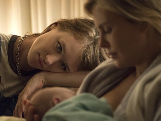 Mackenzie Davis, left, and Charlize Theron in a scene from Tully.