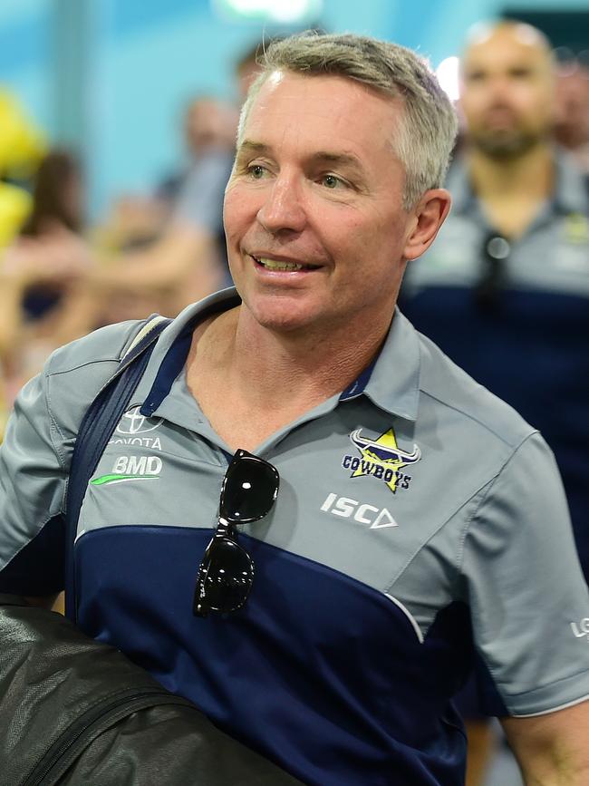 Nth Qld Cowboys leave for Sydney to play in the NRL Grand Final against Melbourne Storm. Coach Paul Green leads the team through the mass of fans.