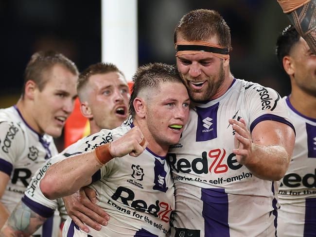 SYDNEY, AUSTRALIA - MARCH 02: Harry Grant of the Storm celebrates with Christian Welch of the Storm after victory during the round one NRL match between the Parramatta Eels and the Melbourne Storm at CommBank Stadium on March 02, 2023 in Sydney, Australia. (Photo by Cameron Spencer/Getty Images)