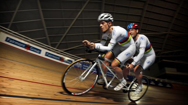 Modra, at 40, with his pilot Scott McPhee during training for the London 2012 Paralympic Games at Adelaide Super-Drome. File picture.