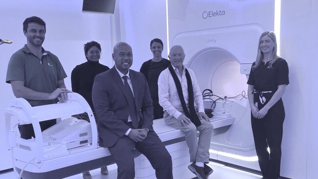 Rod Brooks (centre right), 68, from North Ryde, with the medical team with the The Elekta Unity MR-Linac. Picture: Supplied