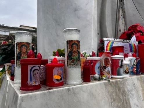 Candles and messages of support have been left outside Gemelli Hospital in Rome where Pope Francis remains in a critical condition. Picture: Sophie Elsworth