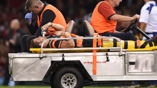 Wales' Leigh Halfpenny leaves the field on a stretcher after getting injured during the rugby union World Cup warm up match at the Millennium Stadium, Cardiff, Wales Saturday Sept. 5, 2015. (Joe Giddens/PA Wire via AP) UNITED KINGDOM OUT, NO SALES, NO ARCHIVE