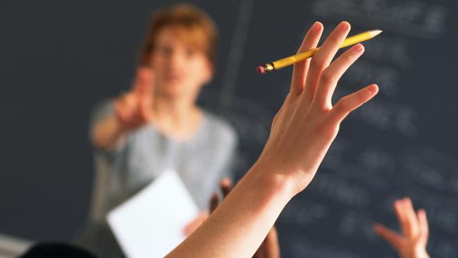 Raised hand in classroom. Picture: Thinkstock