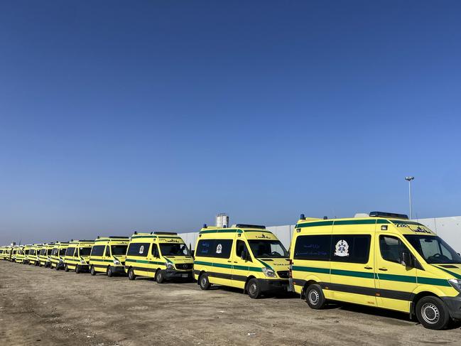 Ambulances queue to cross the Rafah border from the Egyptian side to transport the injured from Gaza to receive treatment. Picture: Getty Images