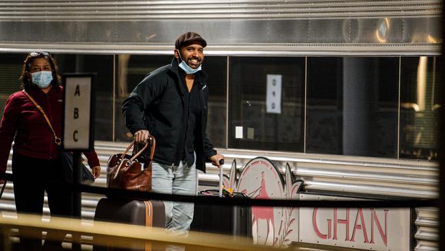 Passengers disembark The Ghan which was turned around at Alice Springs instead of going on to Darwin. Picture: Morgan Sette/AAP