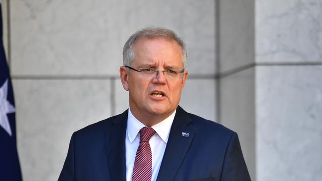 Prime Minister Scott Morrison at a press conference to give a coronavirus update at Parliament House. (AAP Image/Mick Tsikas)