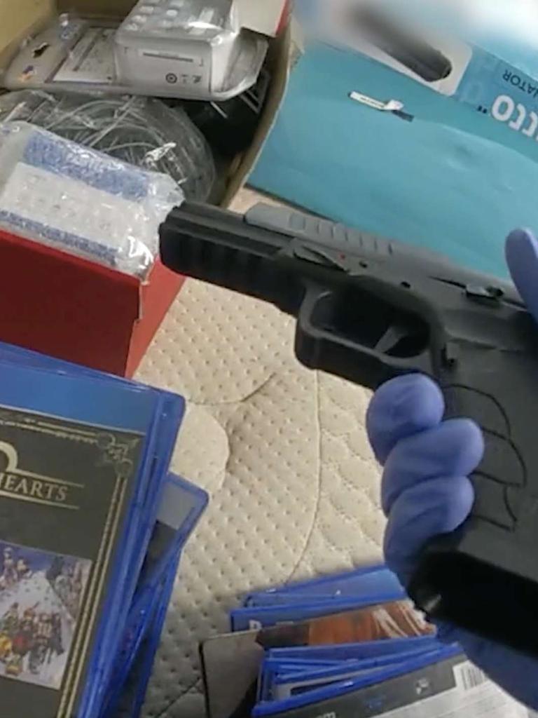A gun seized in the raids. Photo Supplied QLD Police