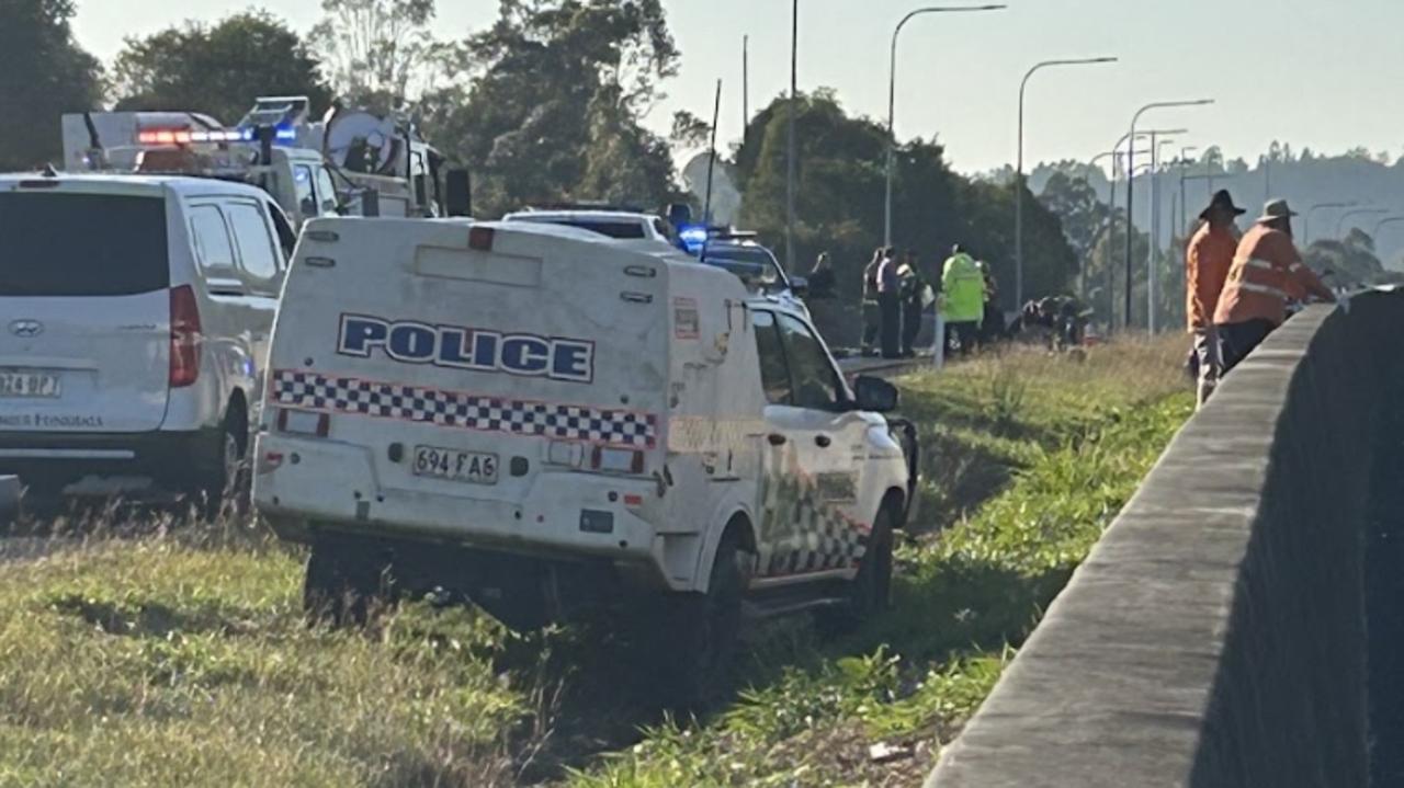 Police and the Forensic Crash Unit at the scene of a triple fatality on the Bruce Highway at Federal. Photo: Chelsea Heaney.