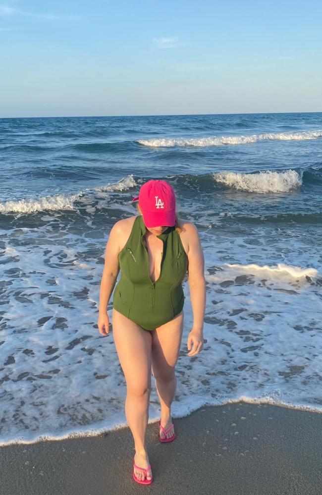 Rebel Wilson hits the waves.