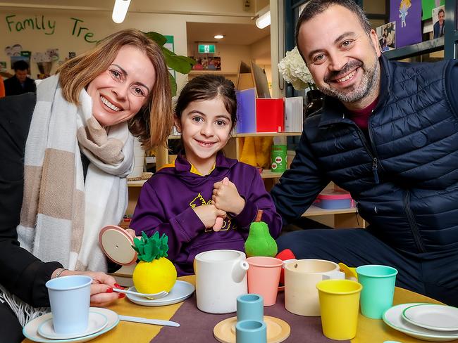 Wesley College student Sofia with her parents Simone and Anna Bartolini. Picture: Ian Currie