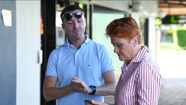 One Nation leader Pauline Hanson is seen with chief of staff James Ashby. Picture: AAP Image/Dave Hunt.