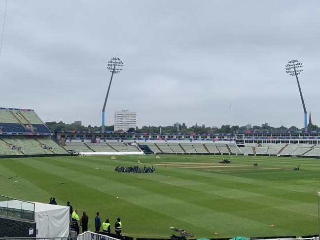 The Aussies sit barefoot in a circle to spiritually connect with the Edgbaston turf. Picture: Sam Landsberger