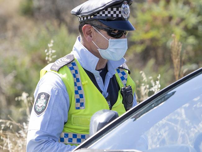 CANBERRA, AUSTRALIA NewsWire Photos  JANUARY  05 2021.ACT/NSW Border closures.  ACT Police check cars at a checkpoint point on the Federal Highway, coming into Canberra from NSW. Picture: NCA NewsWire / Gary Ramage