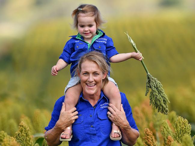 Farmer Kate Gunn of Pine Cliffs property Gunnedah NSW. Photographed in their Sorghum crop with her two year old daughter Zoe. Picture: Paul Matthews