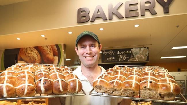 Woolworths and Coles stock hot cross buns as early as January. Picture: Jono Searle