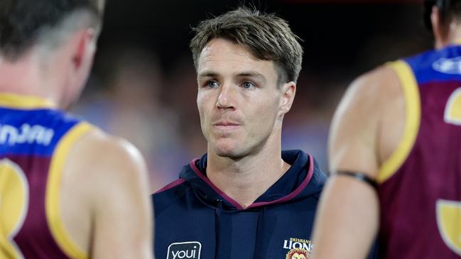 BRISBANE, AUSTRALIA - MAY 05: Lincoln McCarthy of the Lions is seen duiring the three quarter time huddle during the 2024 AFL Round 08 match between the Brisbane Lions and the Gold Coast SUNS at The Gabba on May 05, 2024 in Brisbane, Australia. (Photo by Russell Freeman/AFL Photos via Getty Images)