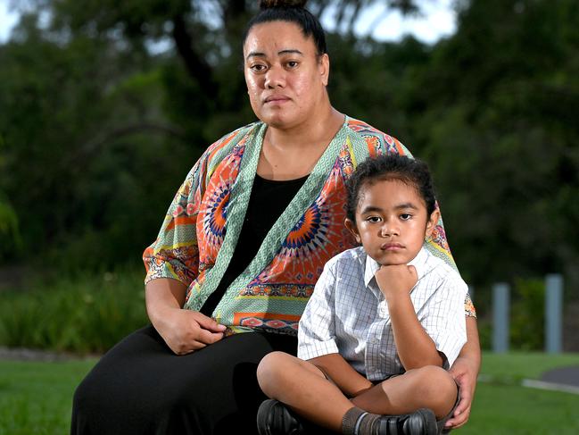 Wendy Taniela with her 5 year old son Cyrus Taniela in a play ground in Upper Caboolture.The mother of a five-year-old boy with long hair says his Caboolture school, Australian Christian College Moreton, told them it had to be cut despite his hair cutting ceremony, which is part of his father’s Cook Islands and Niuean heritage, being still a year awayMonday February 10,2020. (AAP image, John Gass)