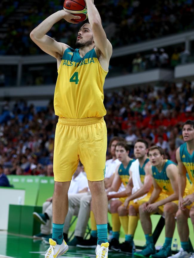 RIO DE JANEIRO, BRAZIL — AUGUST 06: Chris Goulding #4 of Australia takes a shot in the second half against France on Day 1 of the Rio 2016 Olympic Games at Carioca Arena 1 on August 6, 2016 in Rio de Janeiro, Brazil. (Photo by Elsa/Getty Images)