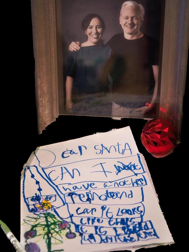 A portrait of Julian and Stella Assange with a letter to santa from their children Picture: Supplied