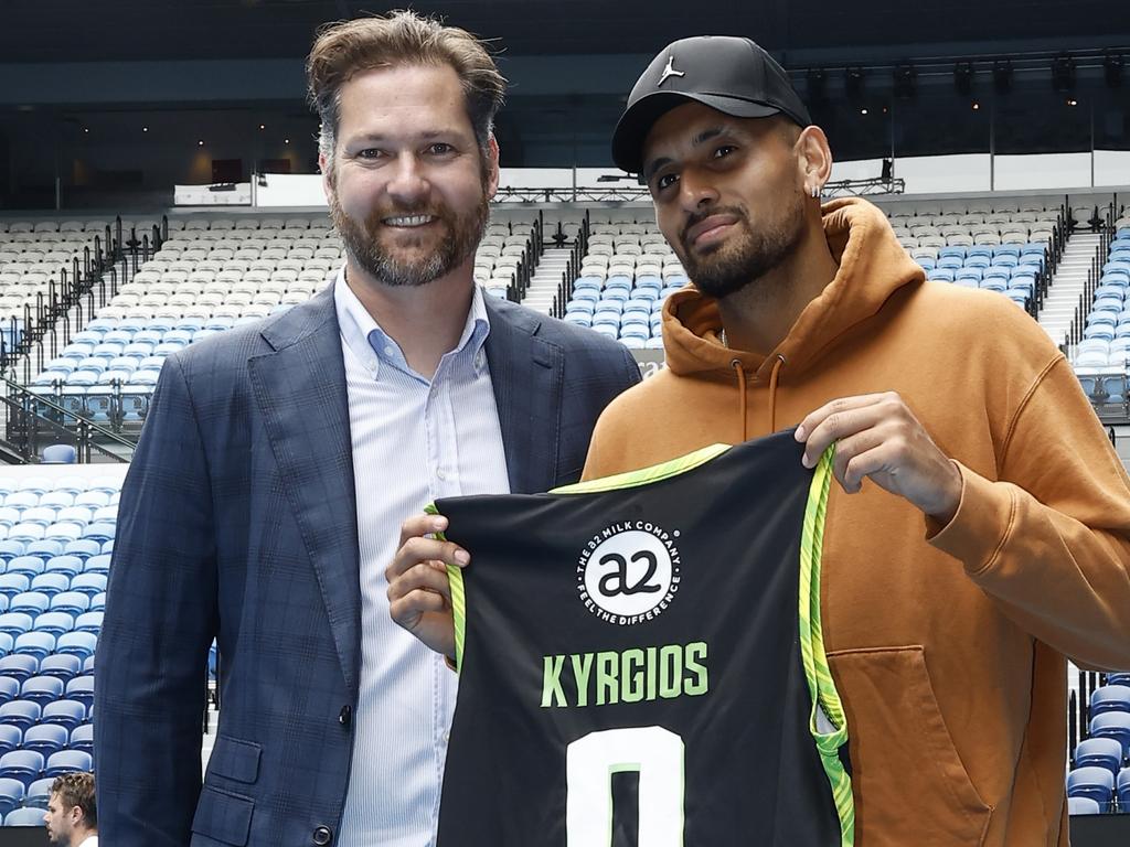 South East Melbourne Phoenix CEO Tommy Greer presents Nick Kyrgios with a Phoenix jersey in January 2023. Picture: Darrian Traynor/Getty Images.