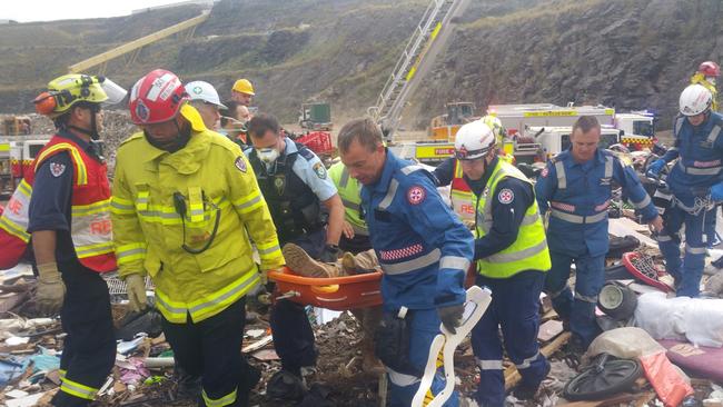 Police are investigating the death of one man and injury of another after being pulled from debris at a waste facility in Eastern Creek this afternoon.