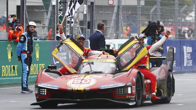 Antonio Fuoco, Miguel Molina, and Nicklas Nielsen celebrate after winning the 24 Hours of Le Mans. Photo by Ker Robertson/Getty Images